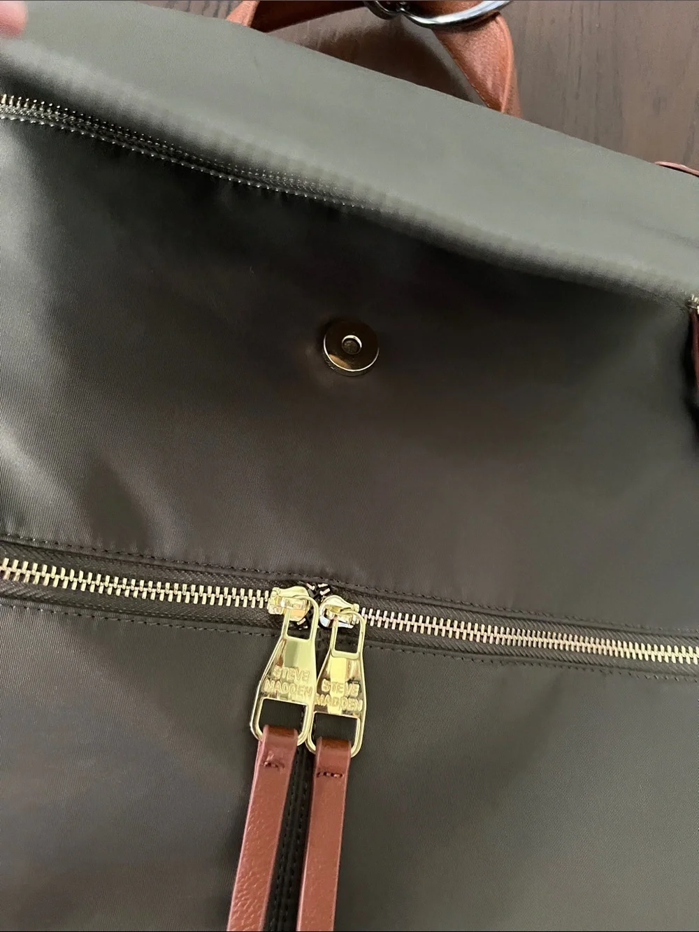 Steve Madden dark green backpack purse with change purse.